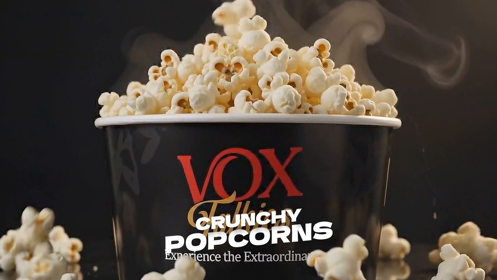 Freshly popped Vox Talkies popcorn in a branded bucket